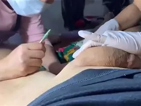 big cock gets a brazillian wax by two ladies
