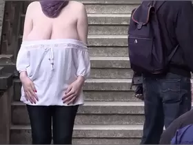 pregnant, busty woman in a frivolous outfit public exposed